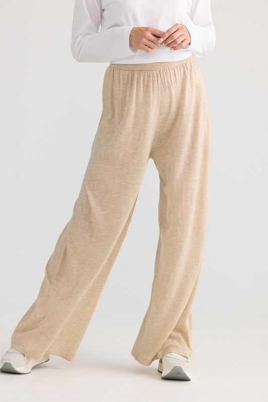 Stillness Knit Pant in oat, showing relaxed leg shape.