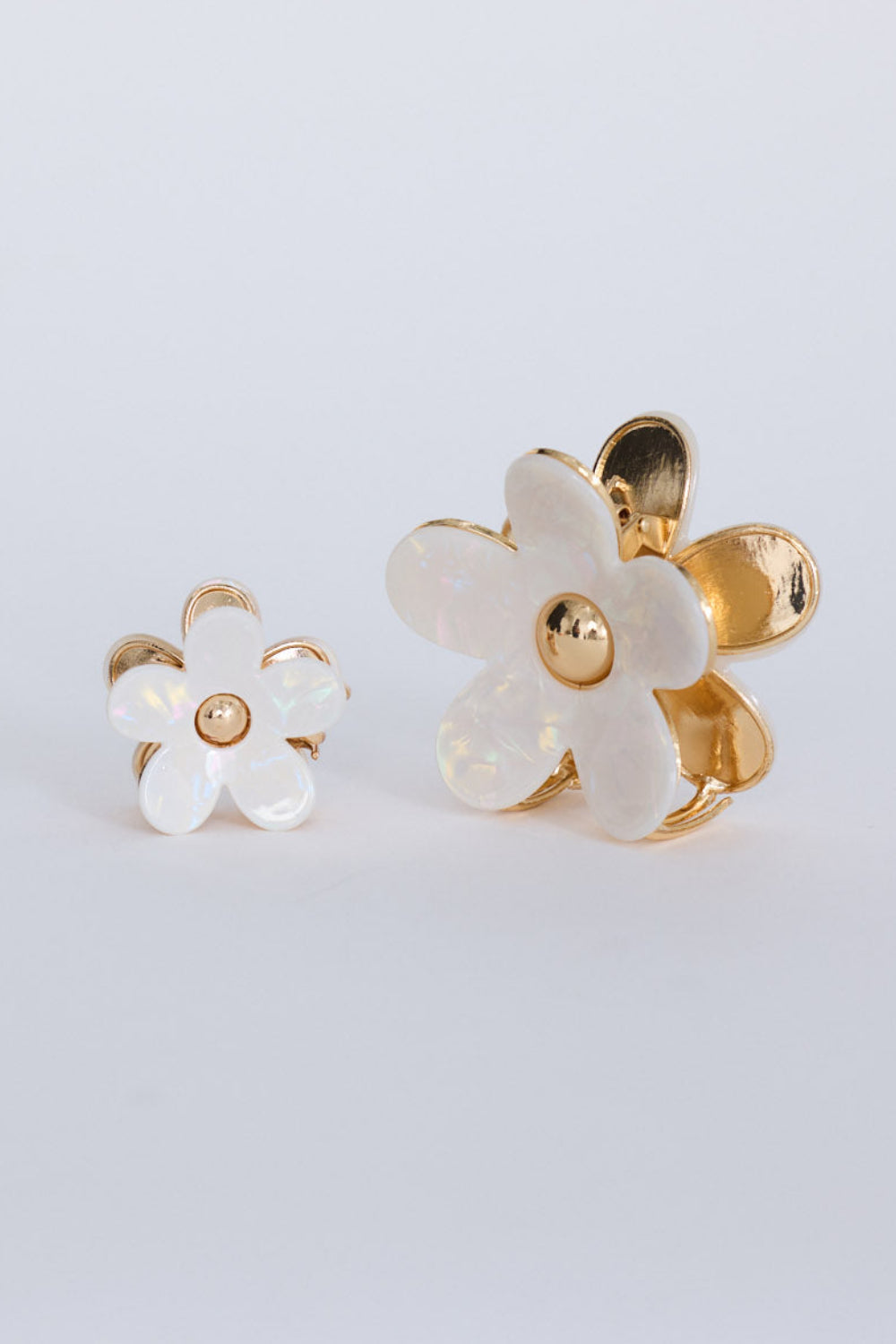 Flora Set Of 2 Hair Claw - Cream hair claw in cream with floral silhouette, front view on white background