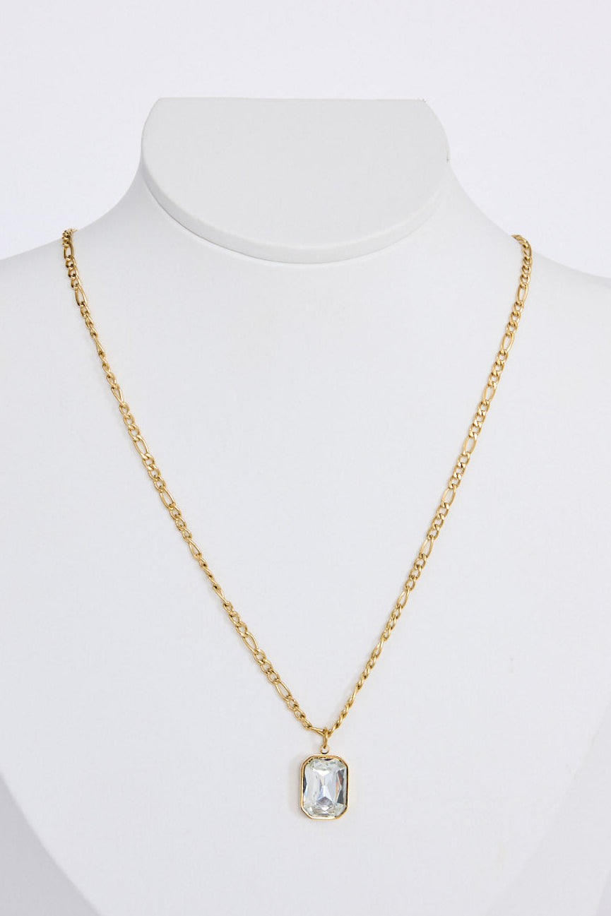 Bovina Necklace in clear with a faceted rectangular pendant, front view on white background