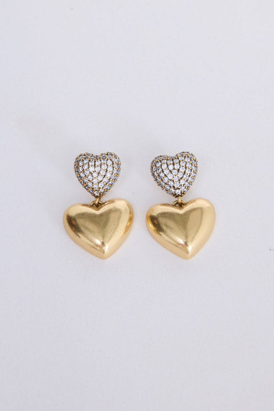 Amelie Earrings in gold with mixed texture detailing, angled view on white background