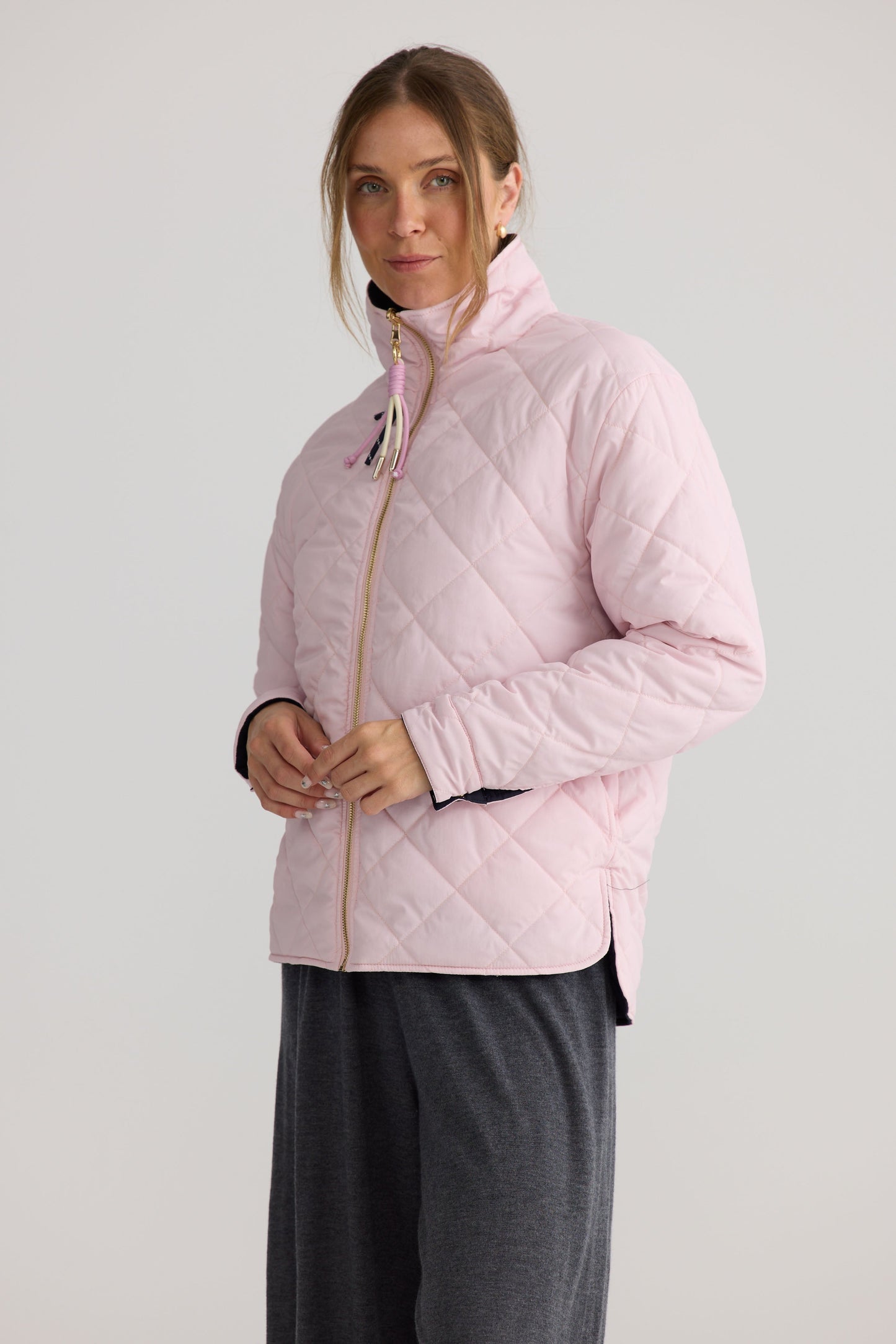 Ellis Puffer in navy with pink, showing puffer quilting.