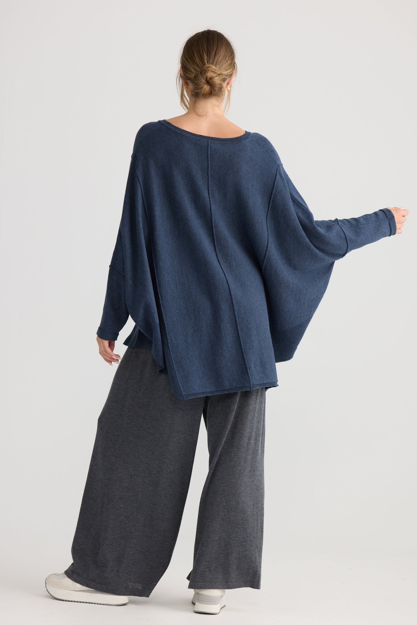 Model wearing Chill Top in navy, styled for everyday wear.