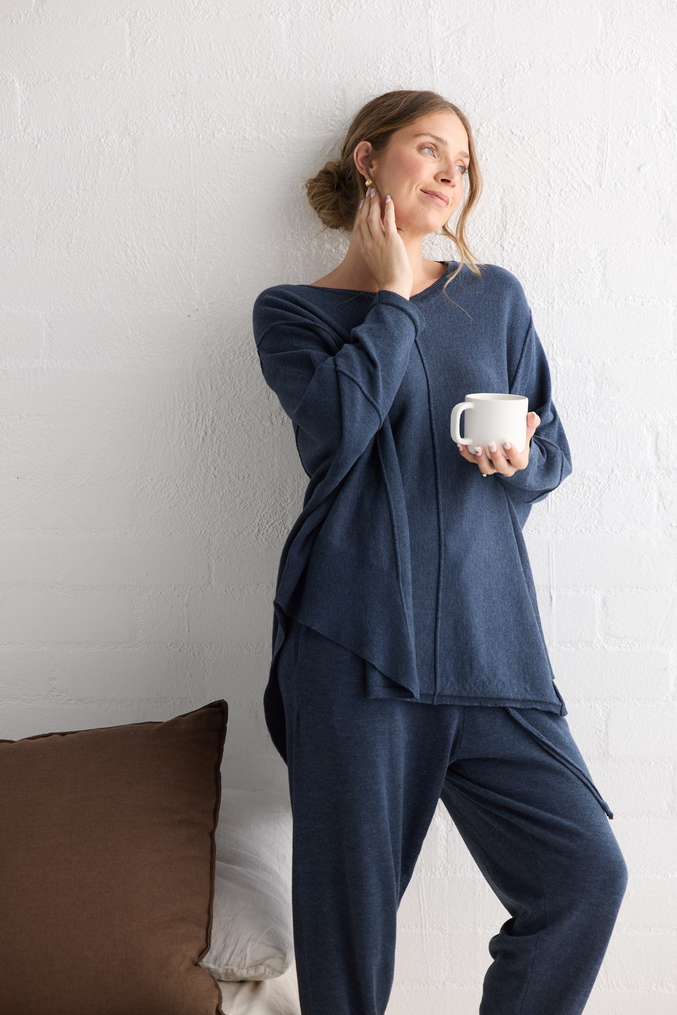 Campaign image of model wearing Chill Top in navy.