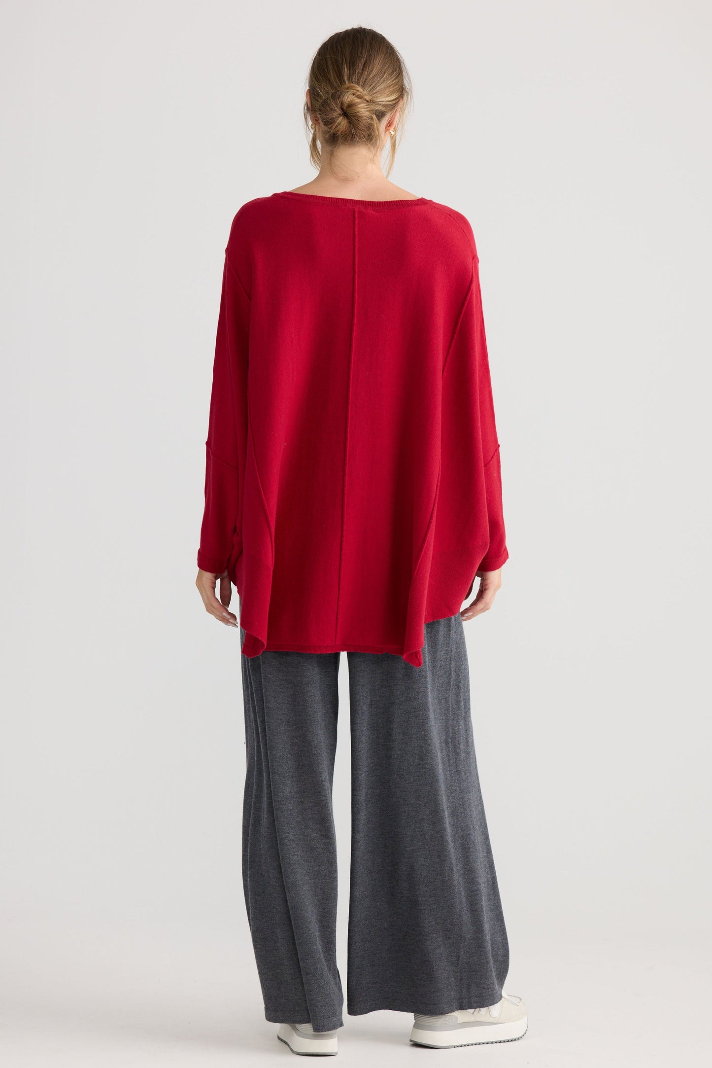 Model wearing Chill Top in scarlet, styled for everyday wear.