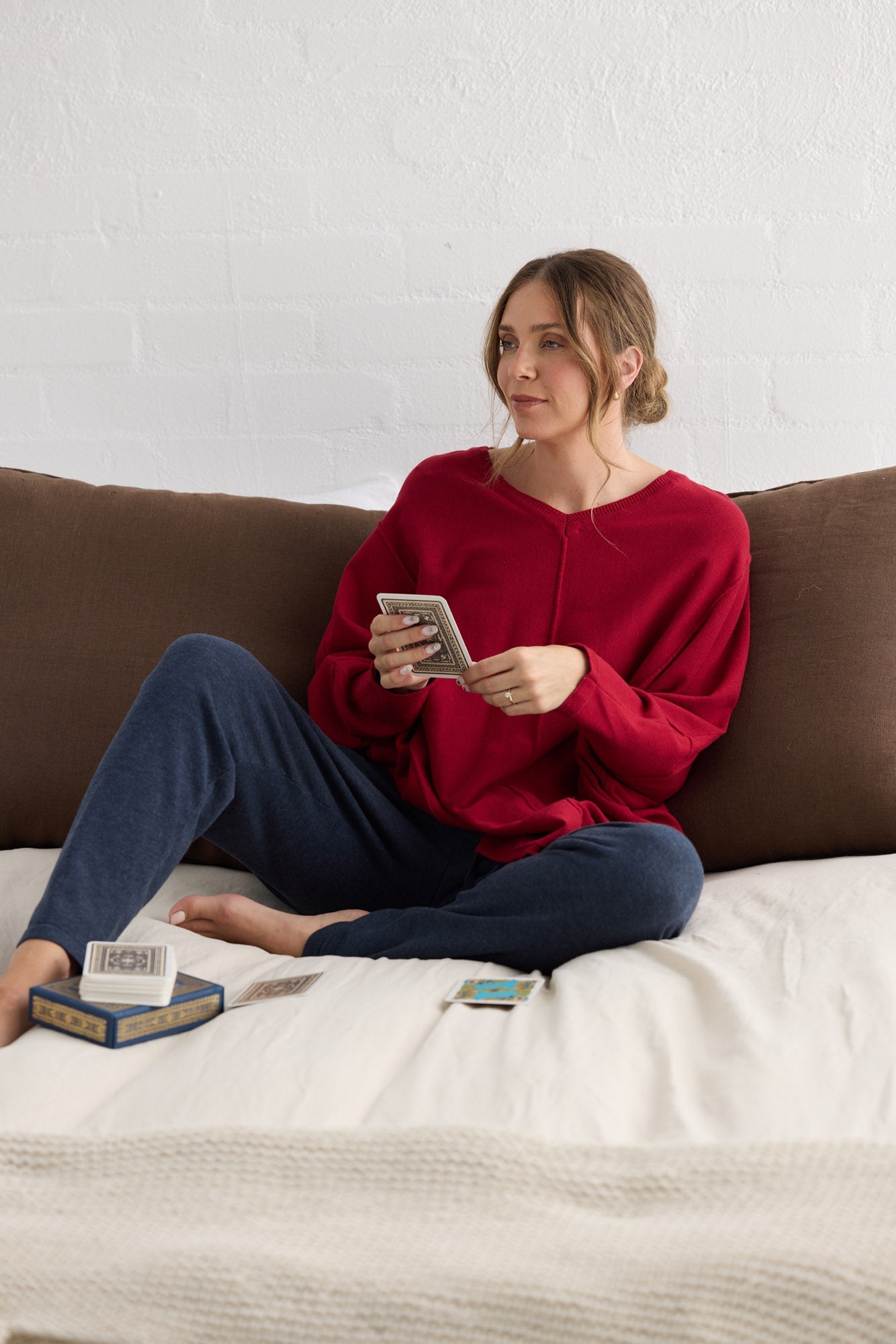 Campaign image of model wearing Chill Top in scarlet.