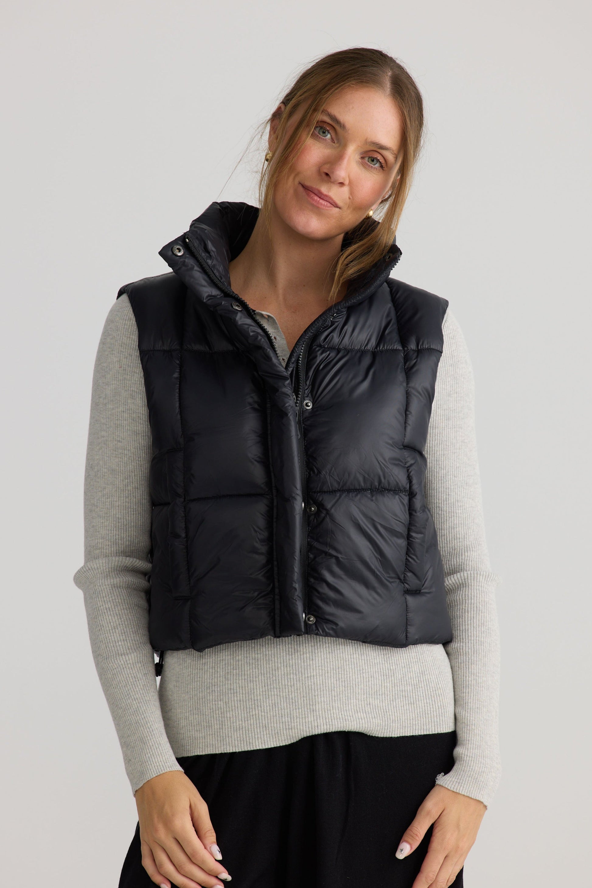 Linden Puffer Vest in black, showing puffer quilting.