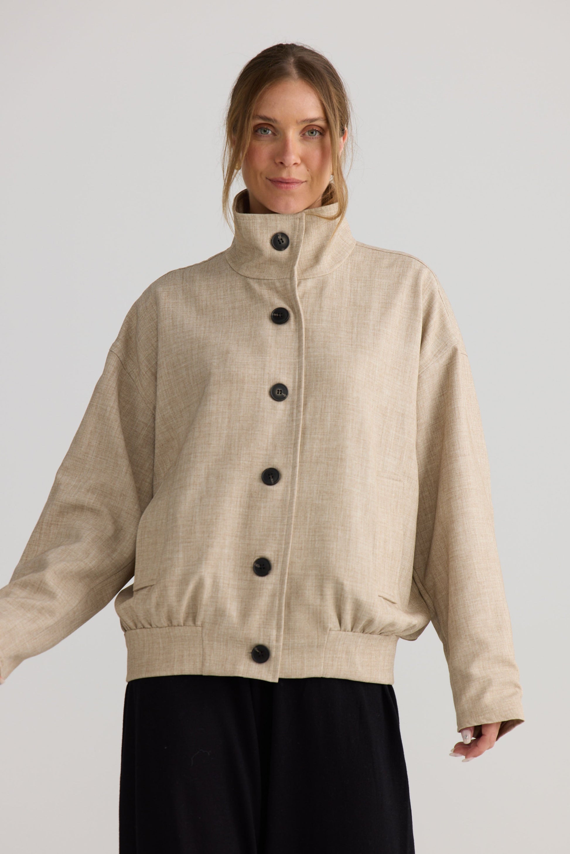 Edie Jacket in stone, shown on model.