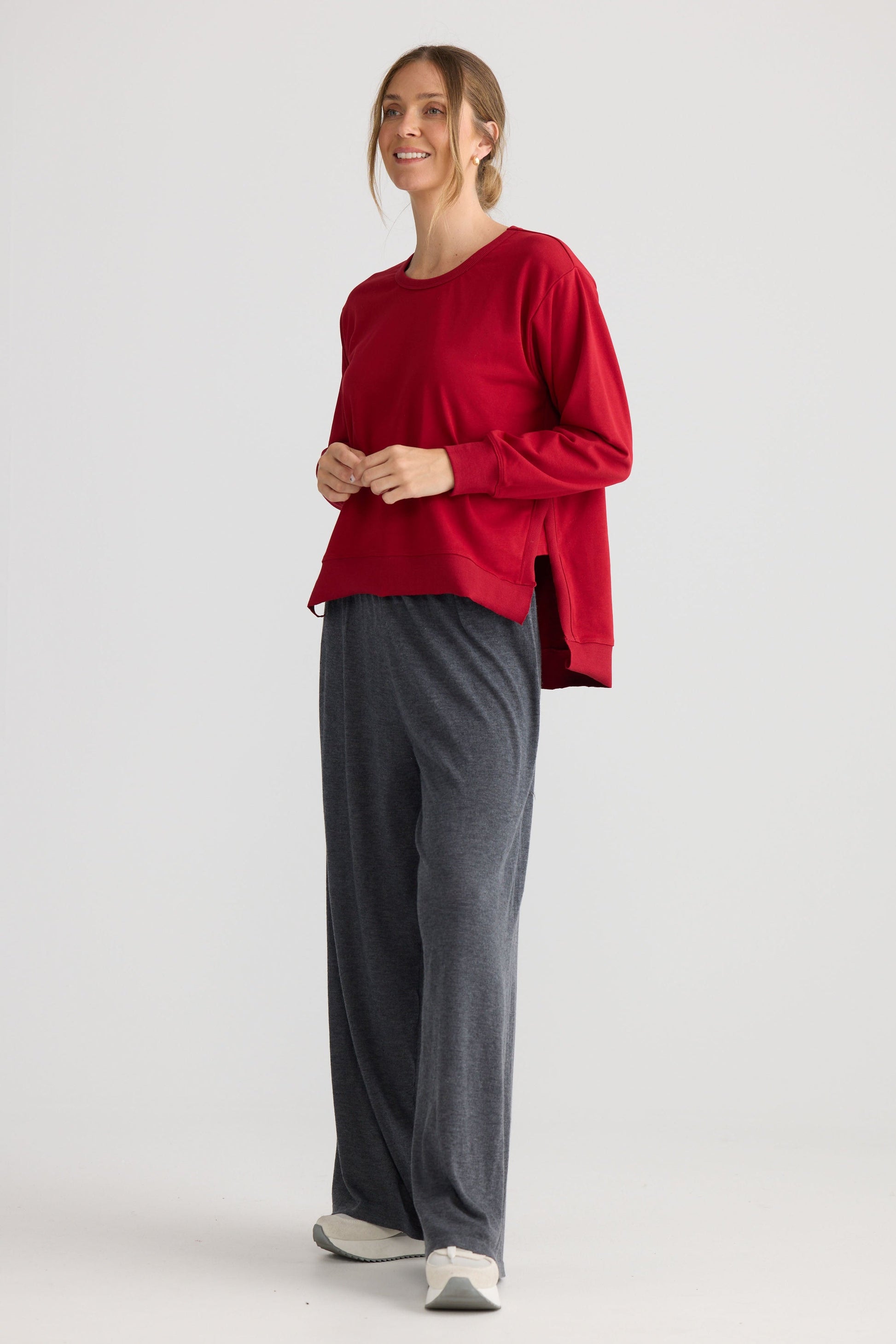 Faye Lounge Jumper in scarlet, showing knit texture.