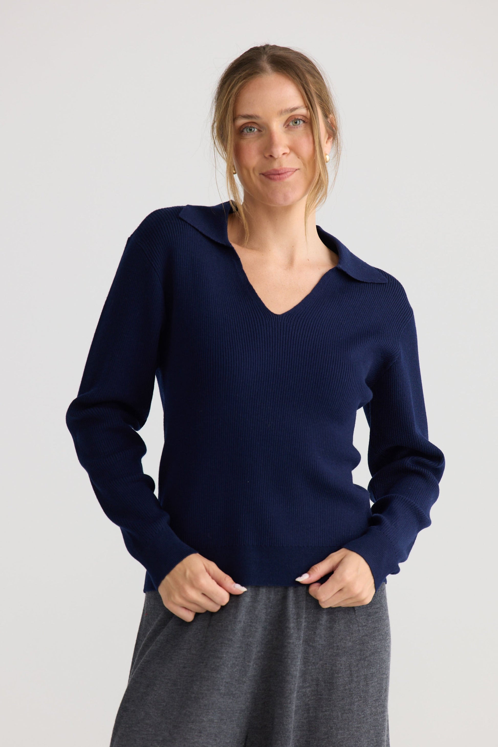 Model wearing Tilda Top in navy, showing relaxed top shape.