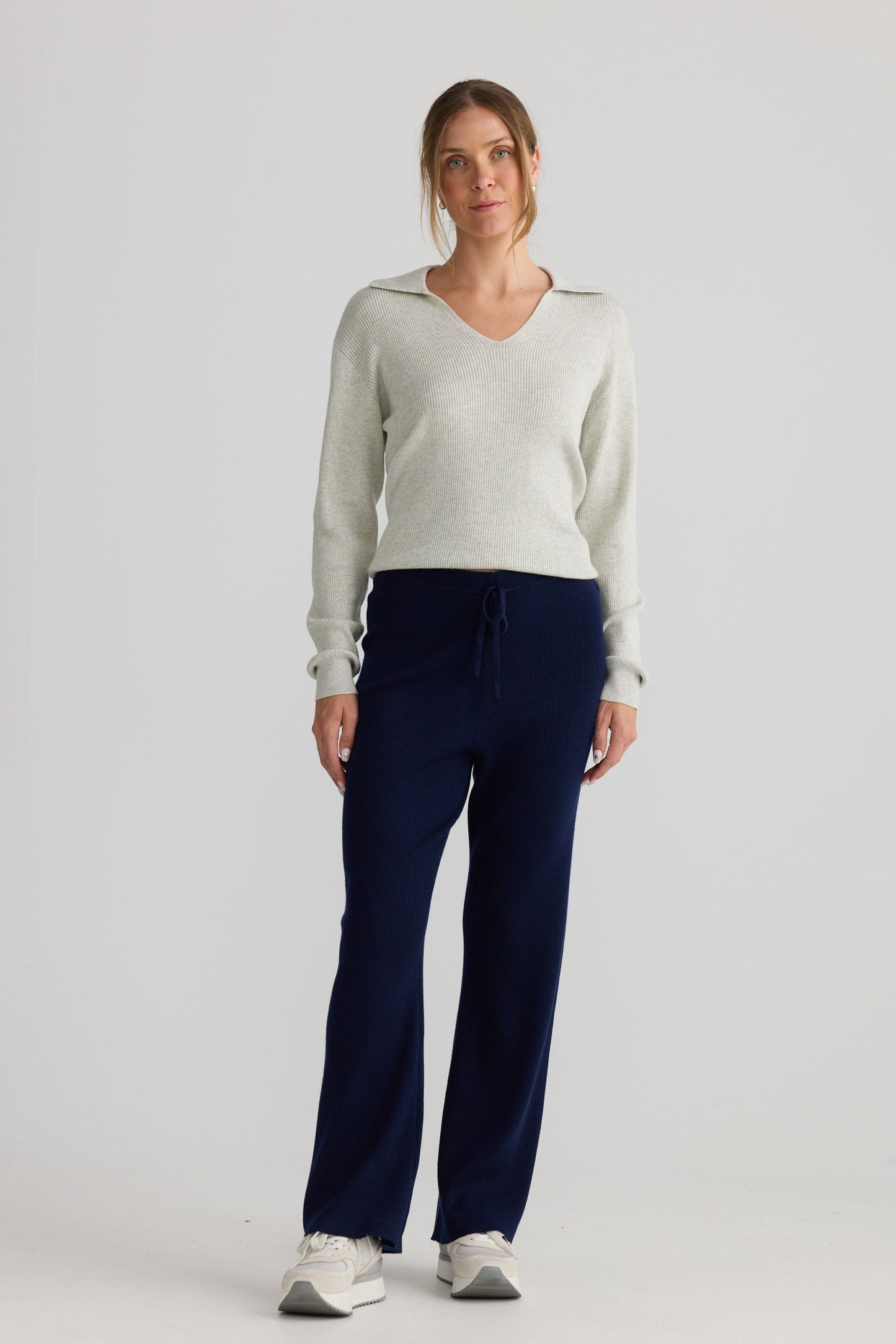 Model wearing Tilda Pant in navy.