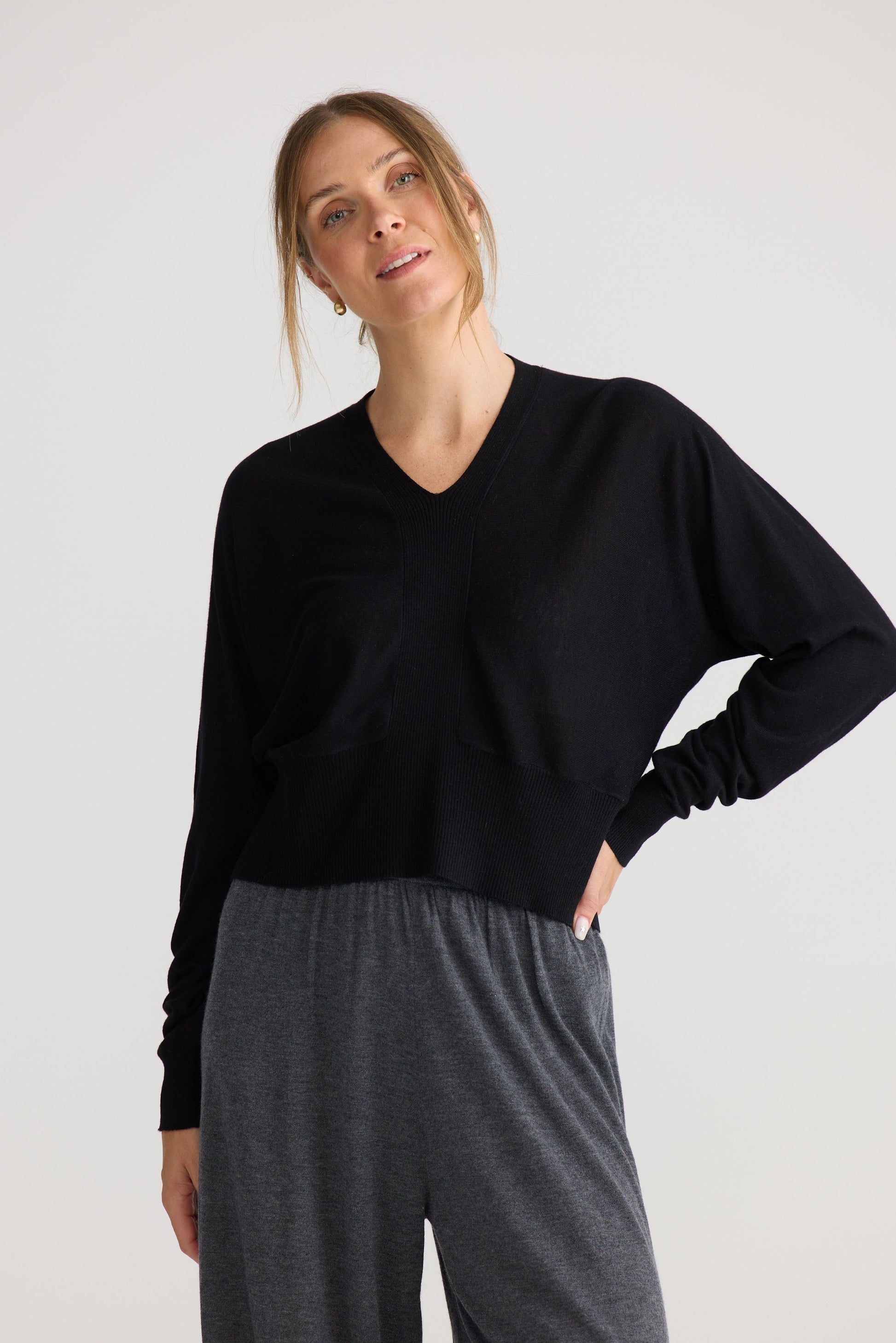 Stillness Knit in black, showing knit texture.