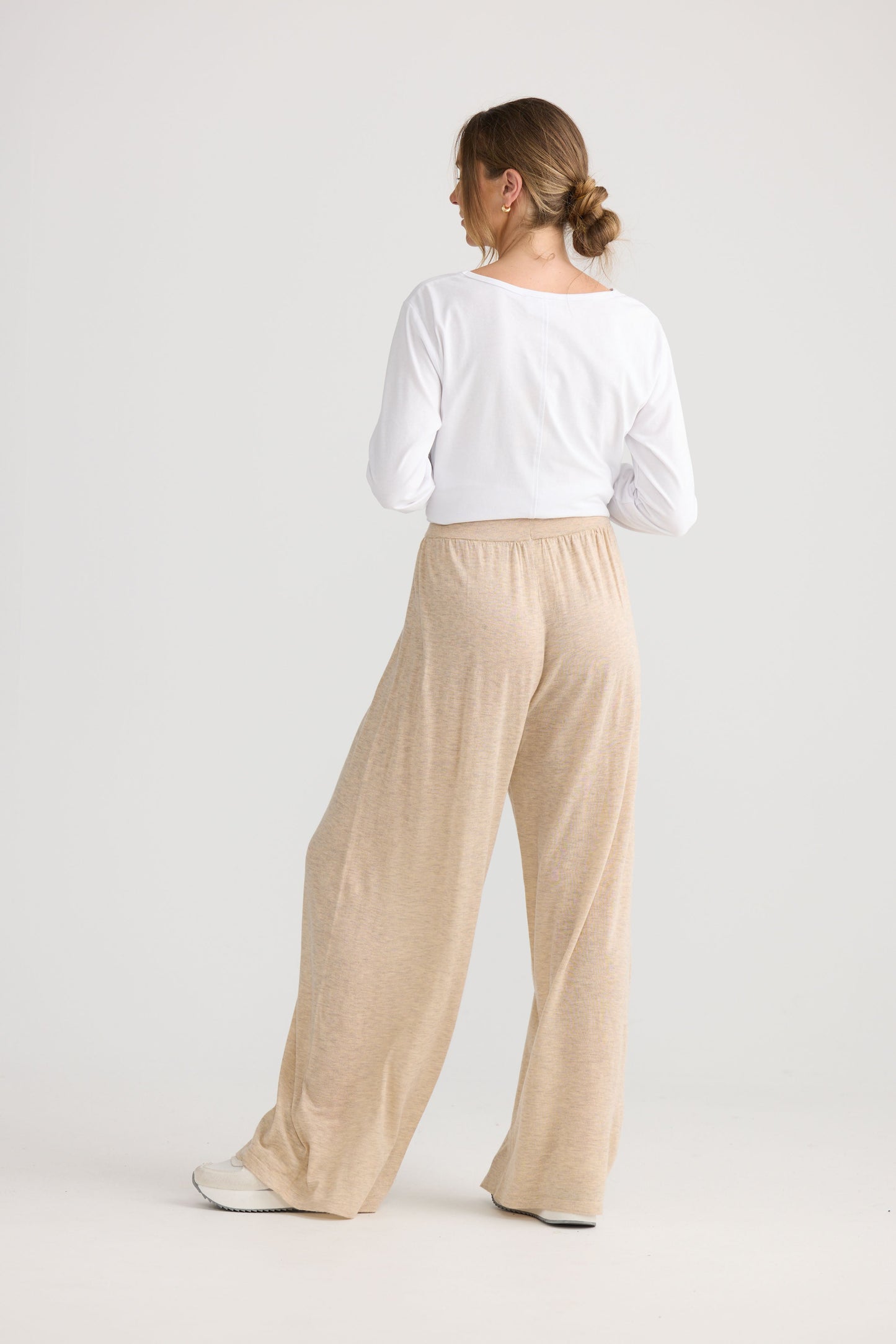Stillness Knit Pant in oat, shown on model.