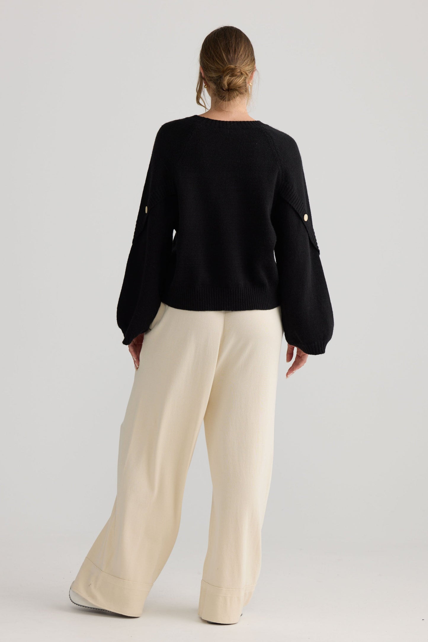Horizon Knit in black, shown on model.