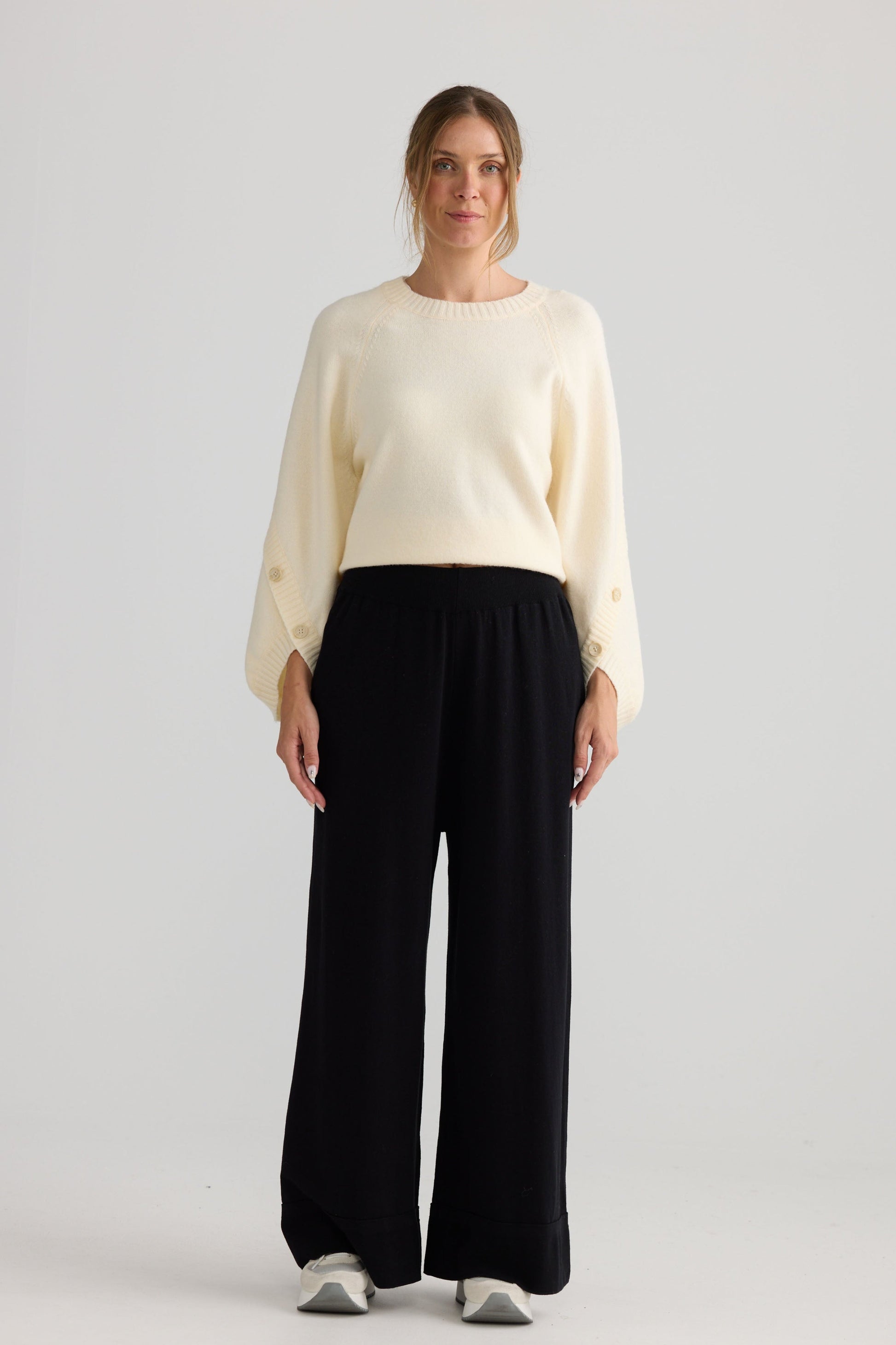 Awaken Knit Pant in black, shown on model.