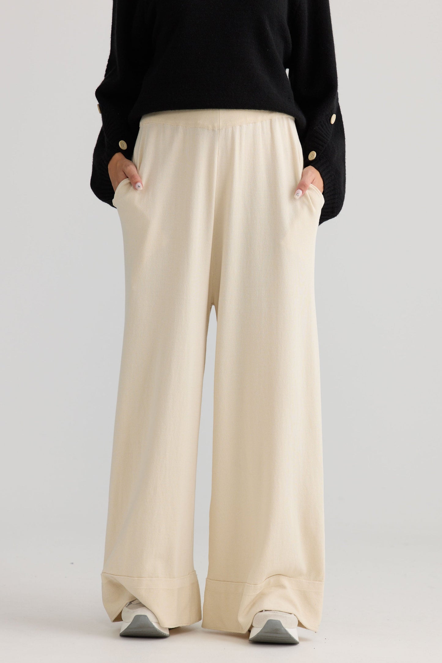 Model wearing Awaken Knit Pant in dove.