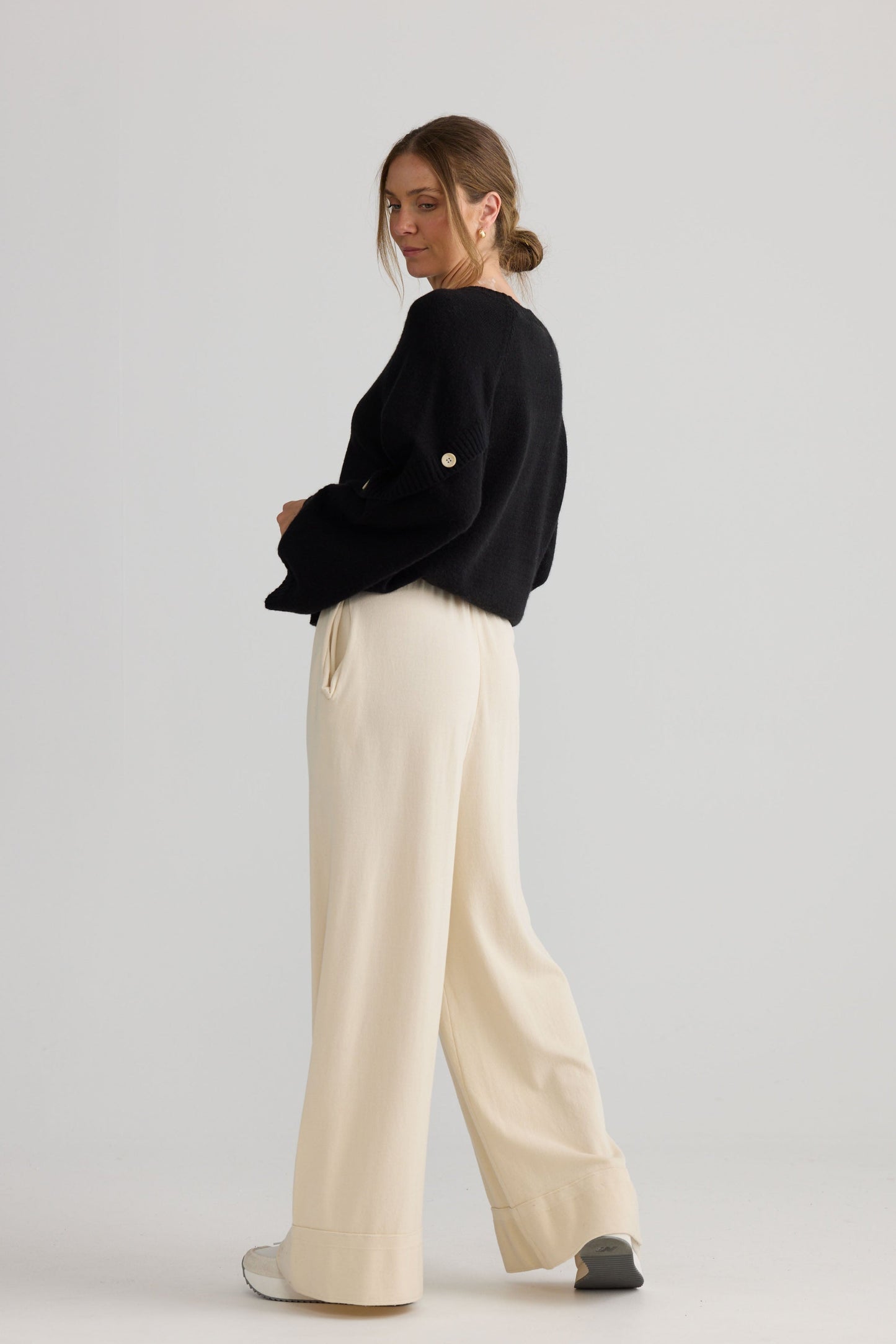 Model wearing Awaken Knit Pant in dove, styled for everyday wear.