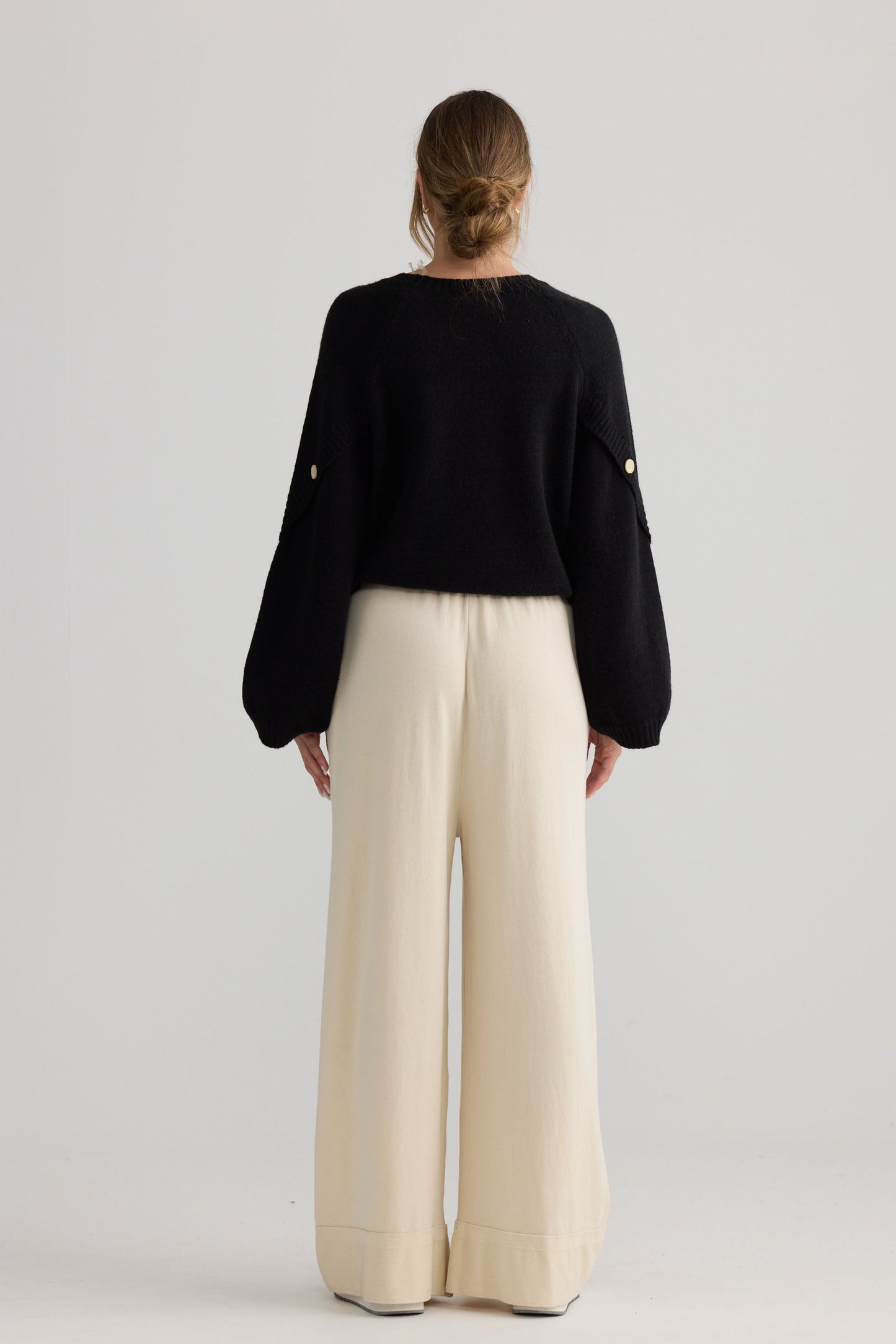 Awaken Knit Pant in dove, shown on model.