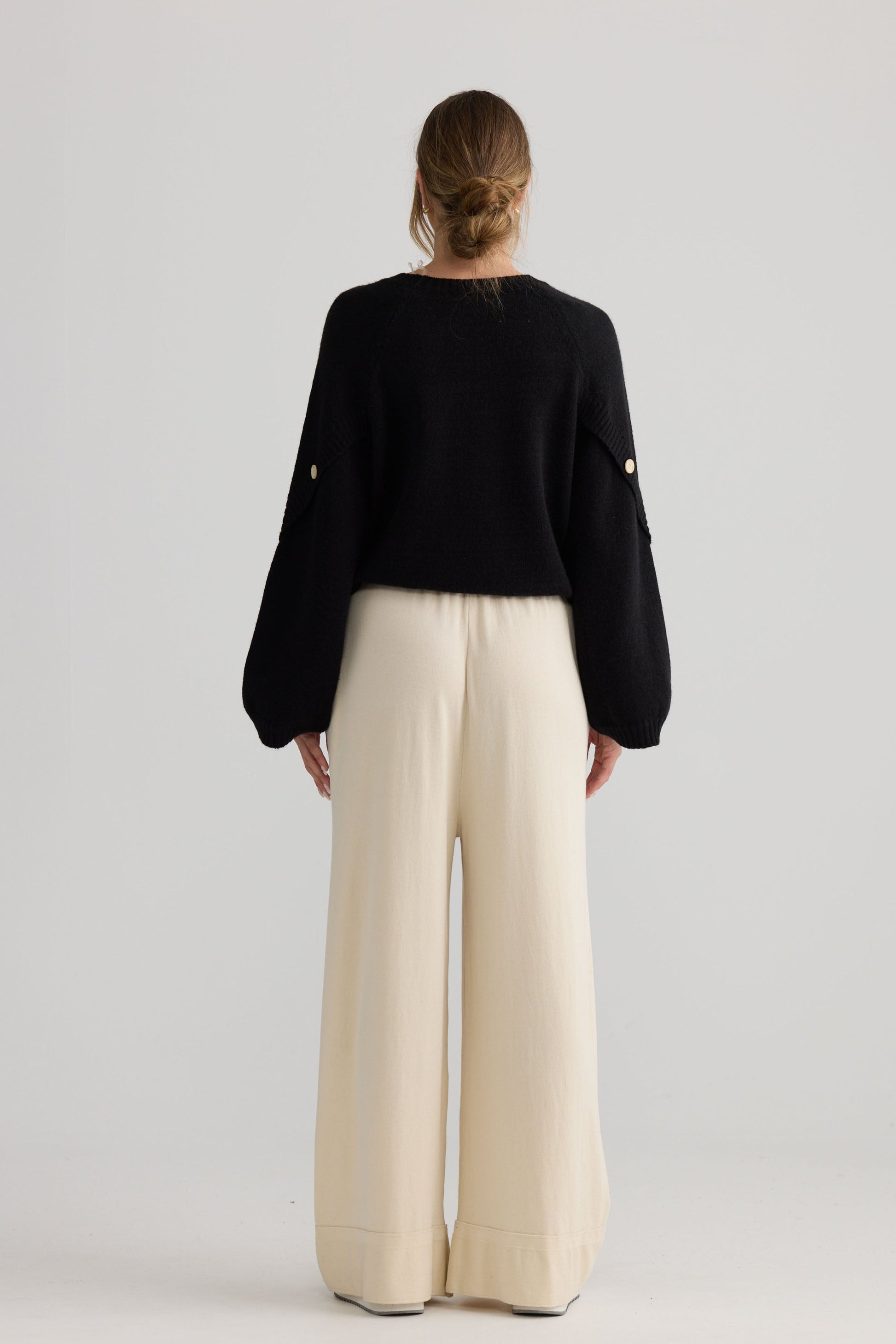 Awaken Knit Pant in dove, shown on model.