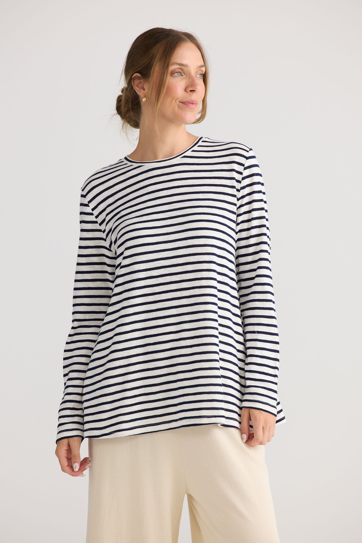 Model wearing Sana LS Top in navy stripe.